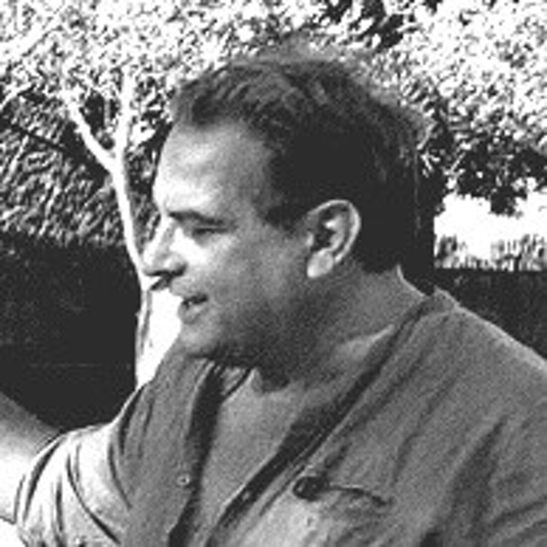 Black-and-white portrait of a man in profile